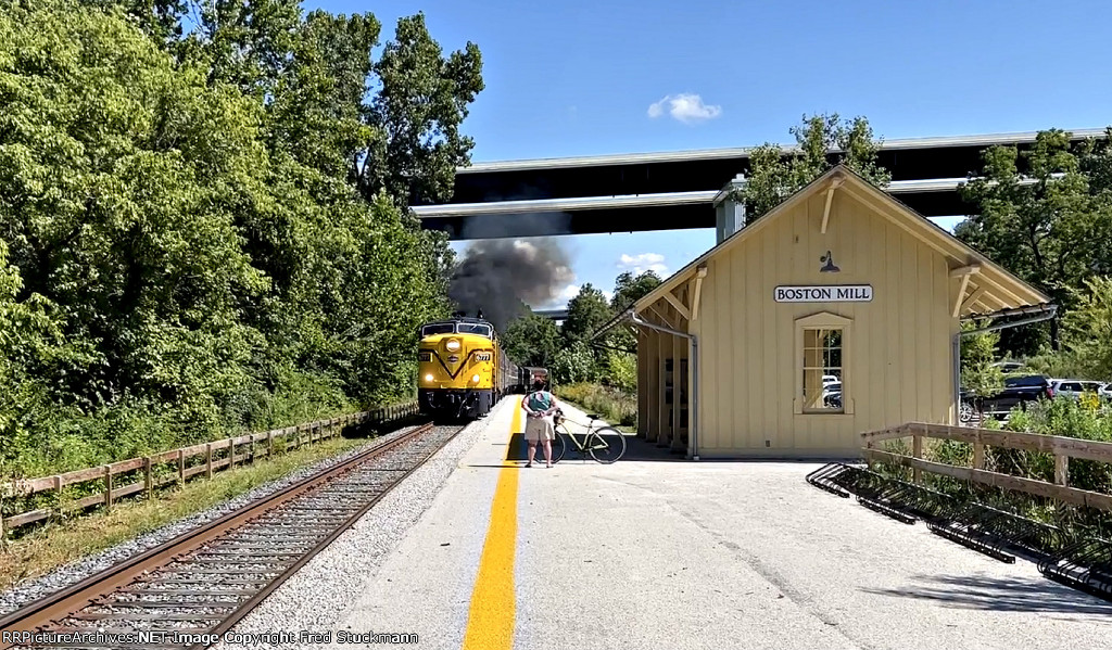 CVSR 6777 gets set to pick up a cyclist and her ride.